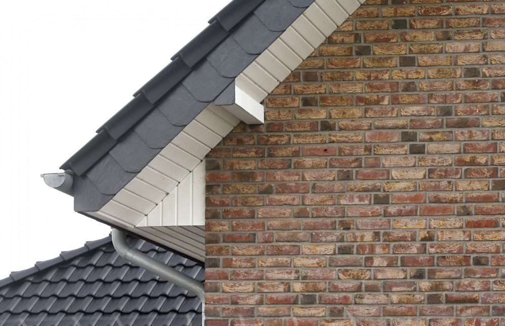 Einfamilienhaus mit weißen Fensterprofilen | Klinkerwerke Muhr